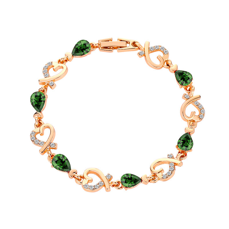 Pulsera de aleación de diamantes de flor hueca de corazón al por mayor